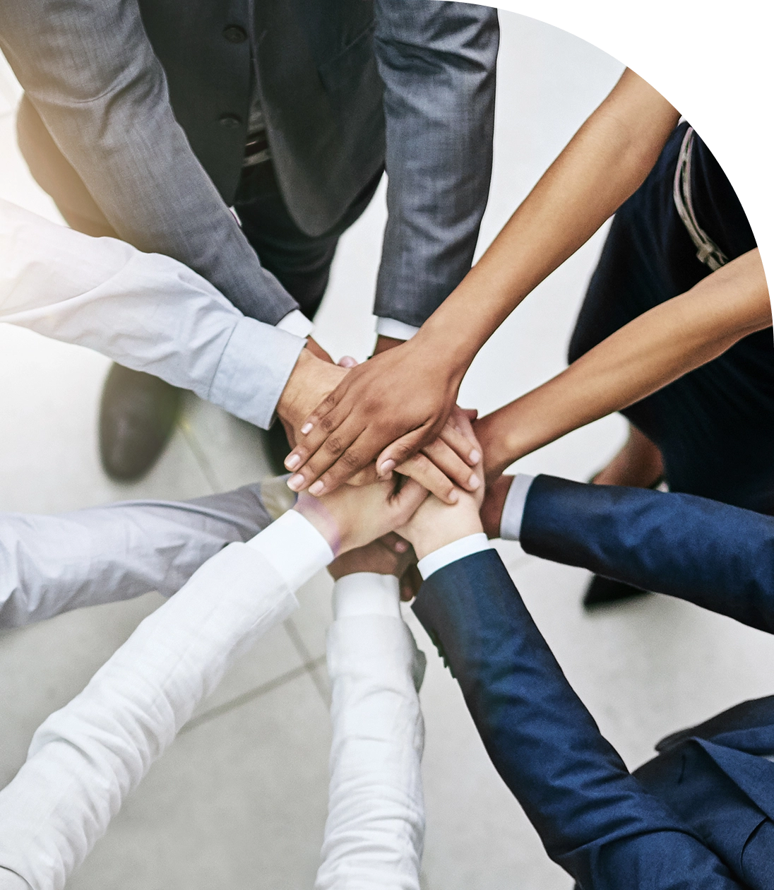 Business team showing unity with hands